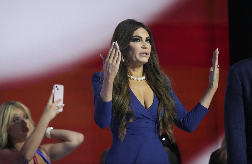 News: Republican National Convention - Fiserv Forum July 16, 2024 Milwaukee WI, USA Kimberly Guilfoyle stands on stage during the second day of the 2024 Republican National Convention. Milwaukee WI US ...