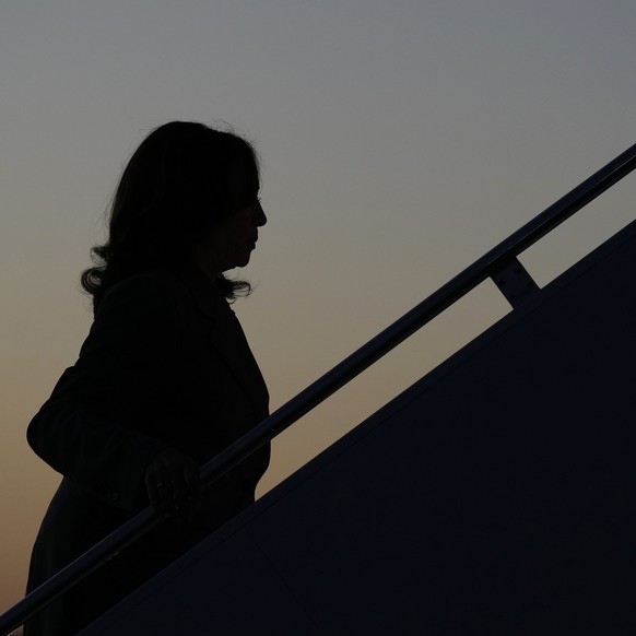 Democratic presidential nominee Vice President Kamala Harris boards Air Force Two during her departure at Dane County Regional Airport, Friday, Sept. 20, 2024, in Madison, Wis. (AP Photo/Charlie Neibe ...