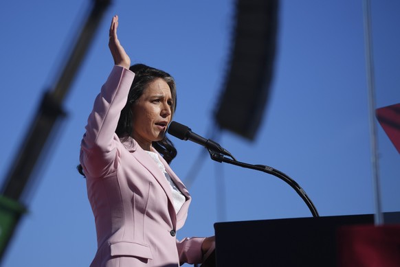 Tulsi Gabbard speaks before Republican presidential nominee former President Donald Trump at a campaign rally in Lititz, Pa., Sunday, Nov. 3, 2024. (AP Photo/Evan Vucci)