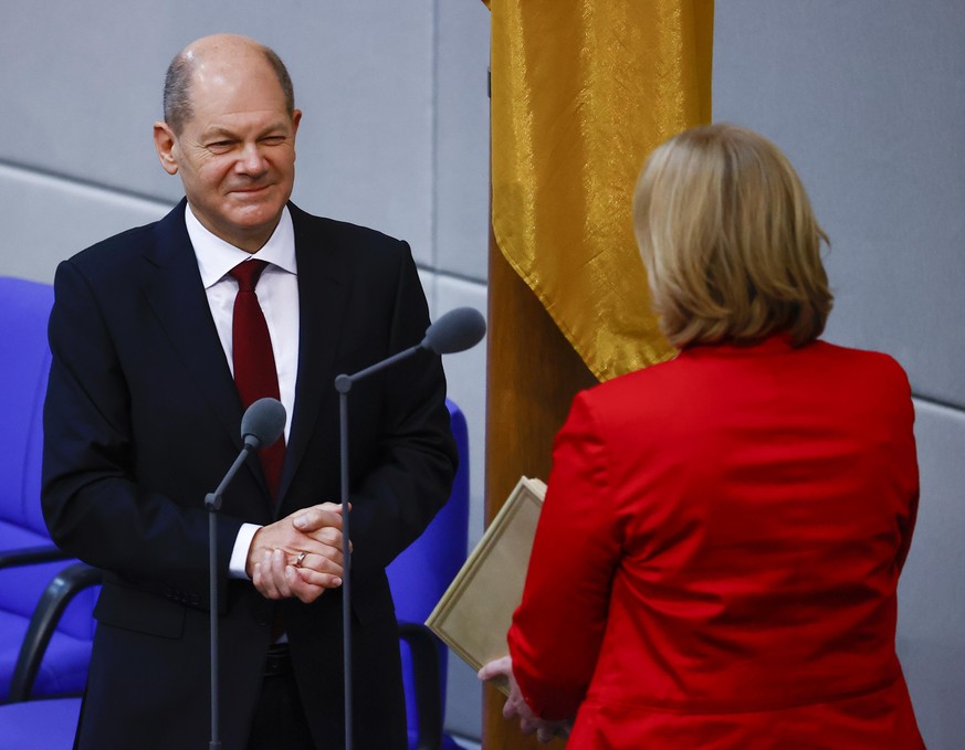 BERLIN, GERMANY - DECEMBER 8: Olaf Scholz (L) swears in as GermanyÄôs new chancellor on December 8, 2021, ending Angela MerkelÄôs historic 16-year tenure, in Berlin, Germany. Scholz, whose Social De ...
