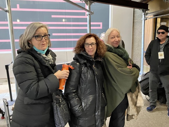 Noted long-time courtroom artists from left Elizabeth Williams, Jane Rosenberg and Christine Cornell wait to enter the courthouse for the trial of former President Donald Trump at Manhattan Criminal C ...