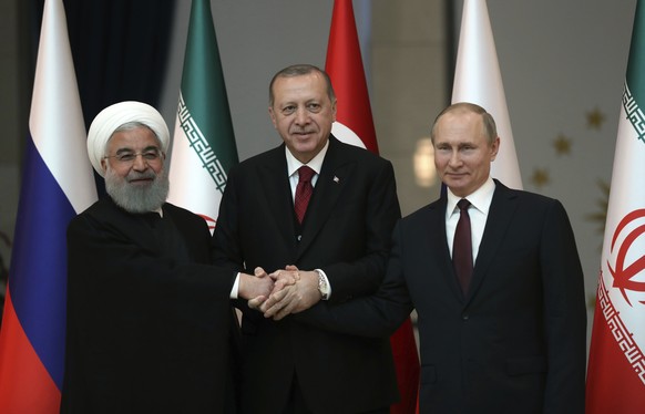 Gute Freunde kann niemand trennen:&nbsp;Hassan Ruhani,&nbsp; Recep Tayyip Erdogan und Wladimir Putin.