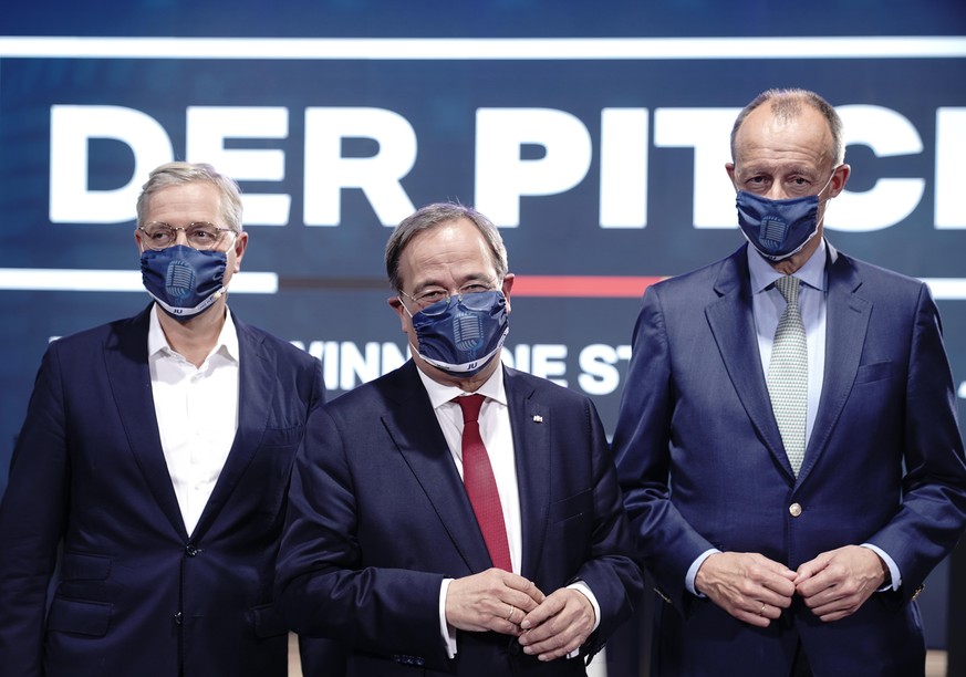 dpatopbilder - 17.10.2020, Berlin: Die drei Kandidaten für den Bundesvorsitz der CDU, Armin Laschet (M), Friedrich Merz (r) und Norbert Röttgen stellen sich den Fragen der Jungen Union (JU) -Mitgliede ...