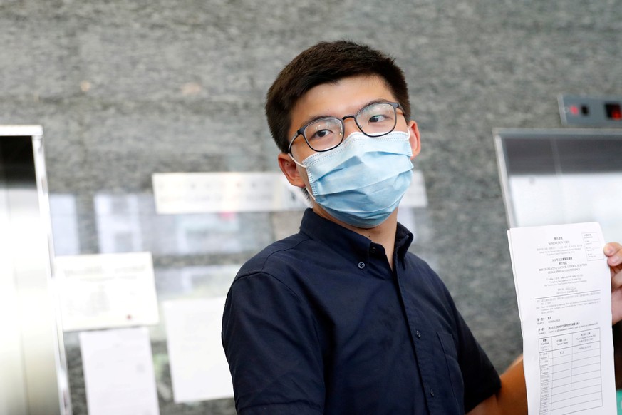 FILE PHOTO: Pro-democracy activist Joshua Wong registers as a candidate for the upcoming  Legislative Council election in Hong Kong, China July 20, 2020. REUTERS/Tyrone Siu/File Photo