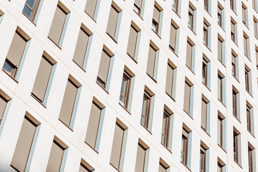 A symmetrical close up of a wall of windows on a building with copy space and design , 34709434.jpg, skyscraper, symmetry, growth, futuristic, horizontal, business, color image, development, downtown  ...