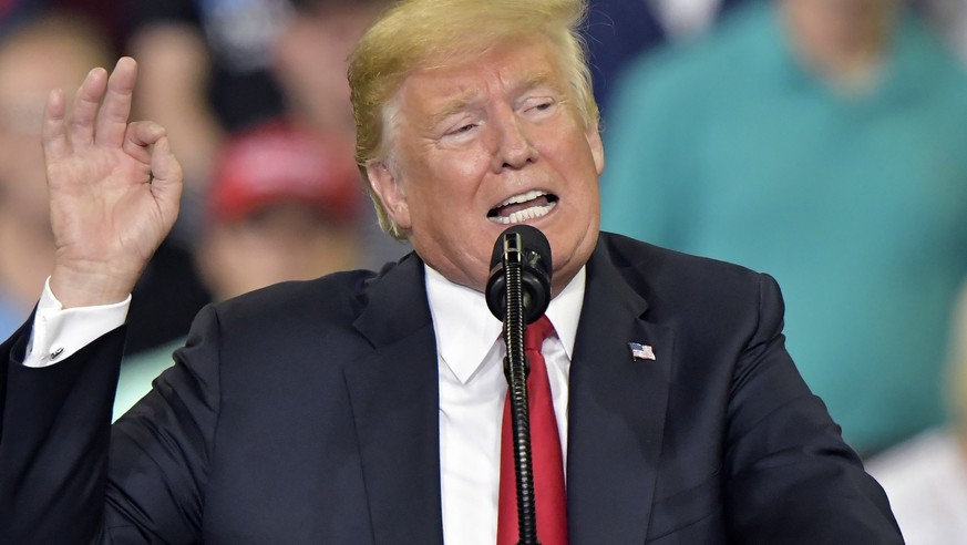 President Donald Trump speaks to a group of supporters at the Ford Center in Evansville, Ind., Thursday, Aug. 30, 2018. (AP Photo/Timothy D. Easley)