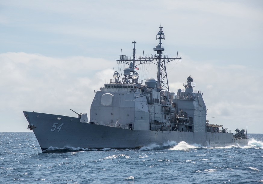 FILE - This Mar. 6, 2016, file photo provided by the U.S. Navy, shows the Ticonderoga-class guided-missile cruiser USS Antietam (CG 54) sails in the South China Sea. China says it dispatched warships  ...