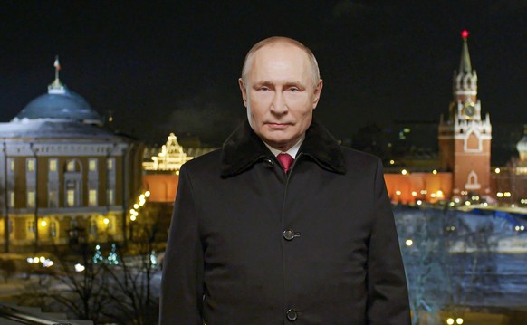 CORRECTS YEAR TO 2022 - In this photo released by Kremlin Press service on Saturday, Jan. 1, 2022, Russian President Vladimir Putin speaks during a recording of his annual televised New Year&#039;s me ...