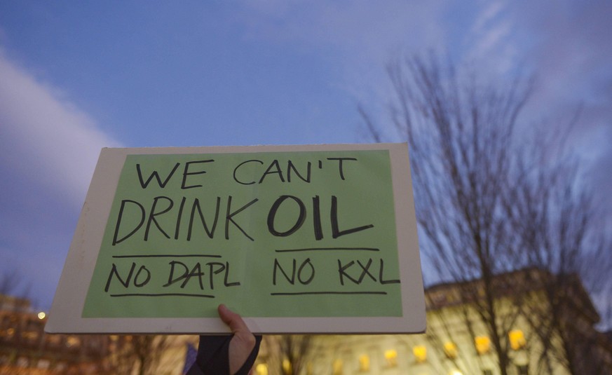 Demonstrators including indigenous leaders and climate activists protest after President Trump announced two executive orders that will advance the Keystone XL and Dakota Access pipelines. The protest ...