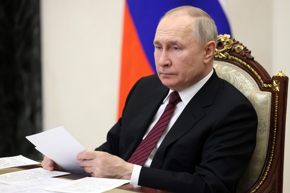 Russian President Vladimir Putin chairs a meeting of the Council for Science and Education via a video conference at the Kremlin in Moscow, Russia, Wednesday, Feb. 8, 2023. (Mikhail Metzel, Sputnik, K ...