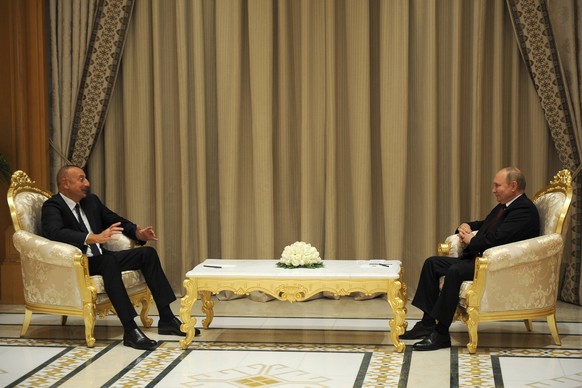 ASHGABAT, TURKMENISTAN - JUNE 29, 2022: Azerbaijan s President Ilham Aliyev L and Russia s President Vladimir Putin hold a meeting. Mikhail Klimentyev/Russian Presidential Press and Information Office ...