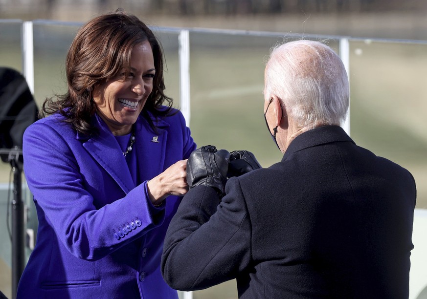 Vice President Kamala Harris bumps fists with President-elect Joe Biden after she was sworn in during the inauguration, Wednesday, Jan. 20, 2021, at the U.S. Capitol in Washington. (Jonathan Ernst/Poo ...