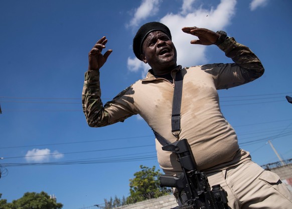 The leader of Haiti s main armed gang, Jimmy Cherizier, alias Barbecue, speaks to the media during a tour of the La Saline neighborhood, in Port-au-Prince, Haiti, 03 November 2021. Barbecue, kingpin o ...