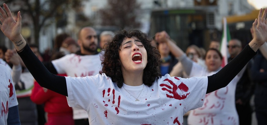 Protest Against Brutality Of Iranian Regime A woman is seen shouting during protest in front of the campus of the University of Warsaw in Warsaw, Poland on 06 November, 2022. Authorities in Iran have  ...