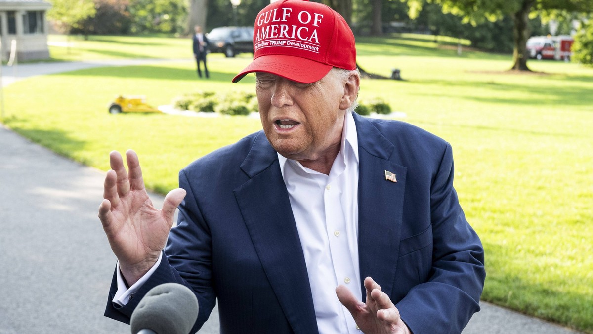 July 1, 2025, Washington, District Of Columbia, USA: President DONALD TRUMP, wearing a red hat that says Gulf of America. Yet another Trump development , speaking with reporters as he leaves the White ...