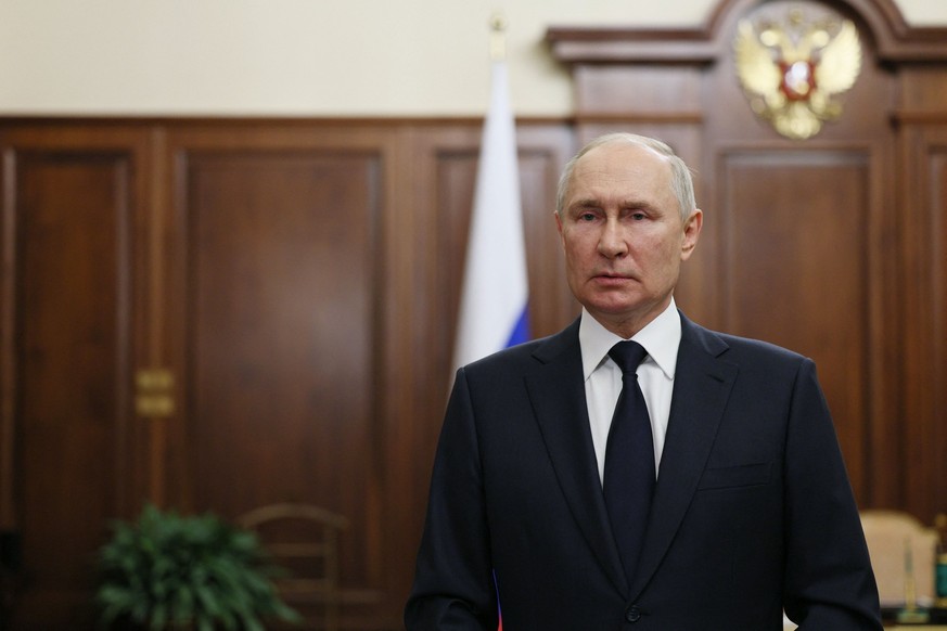 TOPSHOT - Russia&#039;s President Vladimir Putin addresses the nation in Moscow on June 26, 2023. Russian President Vladimir Putin said on June 26, 2023 that he gave an order to avoid bloodshed during ...