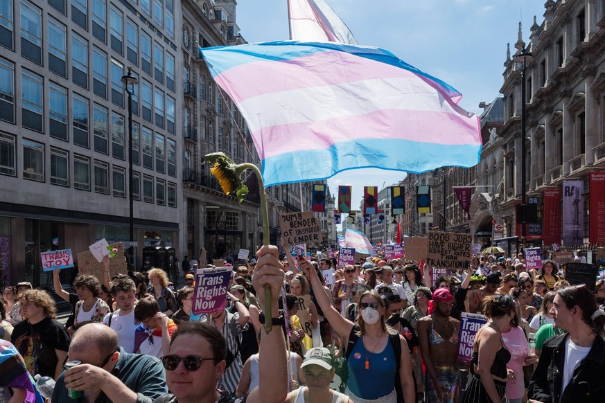 Trans Pride Protest In London LONDON, UNITED KINGDOM - JULY 09, 2022: Transgender people and their supporters march through central London during the fourth Trans Pride protest march for equality on J ...