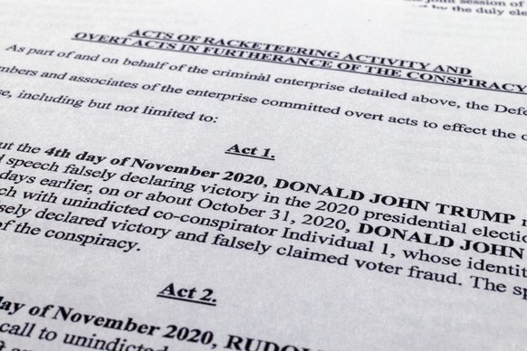 The indictment in Georgia against former President Donald Trump is photographed Monday, Aug. 14, 2023. Trump and several allies have been indicted in Georgia over efforts to overturn his 2020 election ...