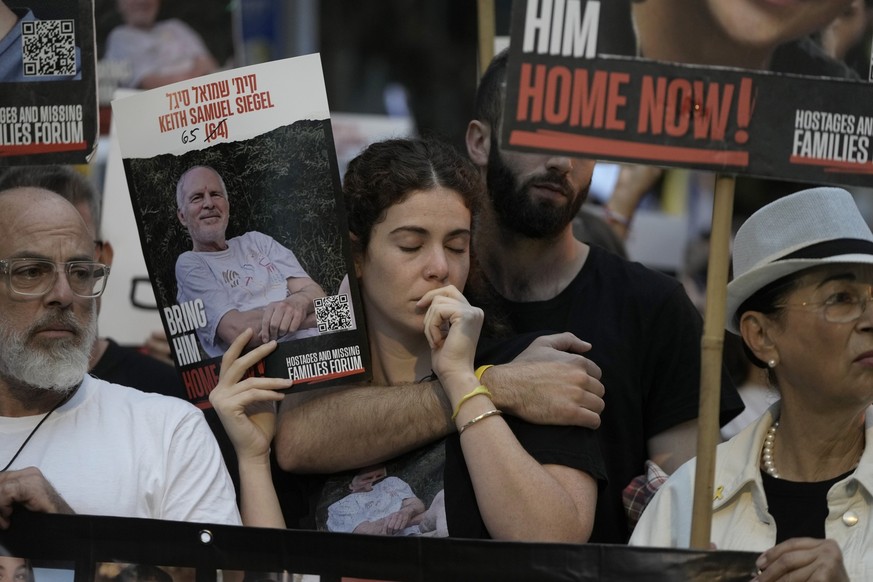 People protest on the one-year anniversary of the Hamas attack on Israel and call for the release of hostages held by Hamas in the Gaza Strip, outside Prime Minister Benjamin Netanyahu&#039;s house, i ...