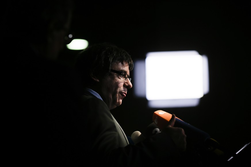 Former Catalan leader Carles Puigdemont addresses the media during a news conference in Berlin, Germany, Tuesday, May 15, 2018. (AP Photo/Markus Schreiber)
