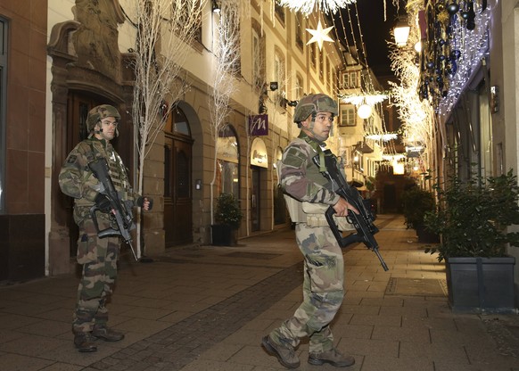 (181211) -- STRASBOURG (FRANCE), Dec. 11, 2018 -- Soldiers stand guard in the center of Strasbourg, France, on Dec. 11, 2018. At least two people were killed and eleven wounded in a shooting near a Ch ...