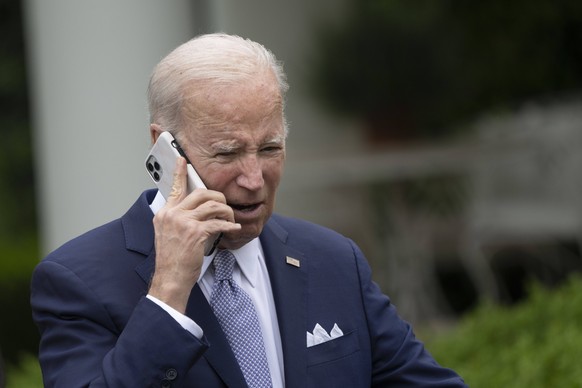 May 1, 2023, Washington, District of Columbia, USA: United States President Joe Biden takes a phone call after making remarks on National Small Business Week, at the White House in Washington, DC, May ...