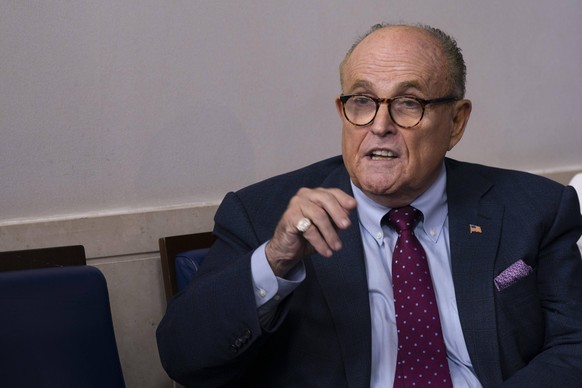 September 27, 2020, Washington, District of Columbia, USA: Former Mayor Rudy Giuliani Republican of New York, New York looks on as United States President Donald J. Trump holds a news briefing in the  ...