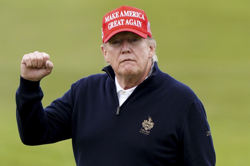Former US president Donald Trump plays golf at Turnberry golf course, Scotland, during his visit to the UK, Tuesday May 2, 2023. (Jane Barlow/PA via AP)