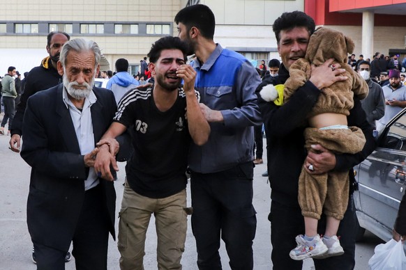 Families of victims of the explosions gather at the courtyard of a hospital in the city of Kerman, about 510 miles (820 kilometres) southeast of the capital Tehran, Iran, Wednesday, Jan. 3, 2024. Two  ...