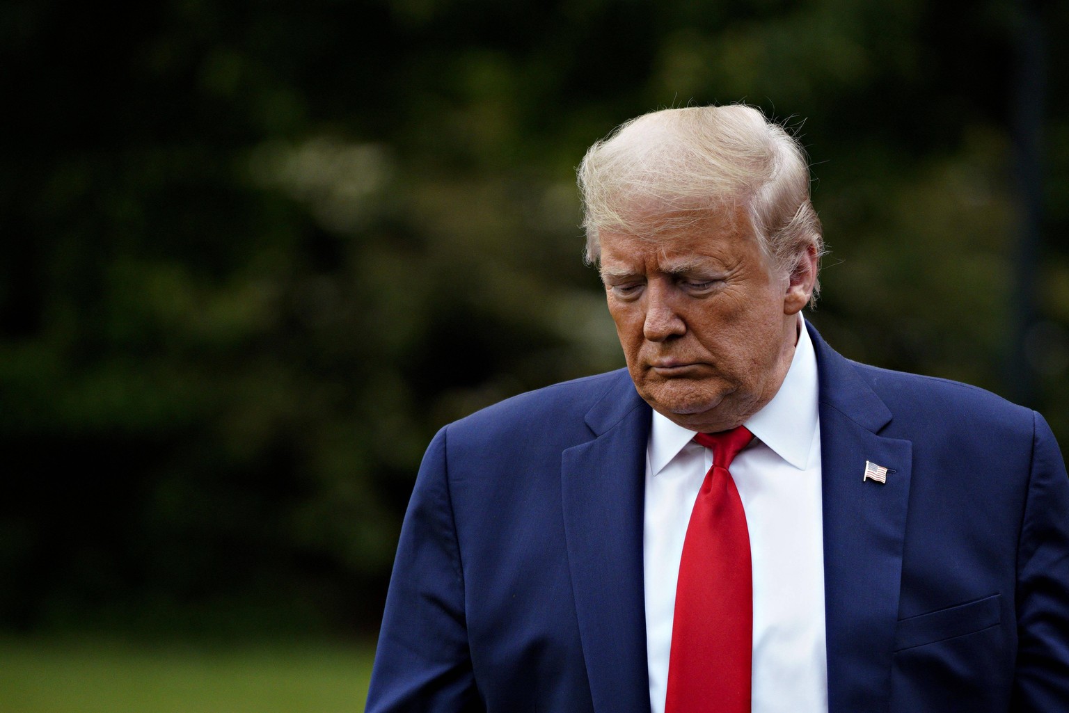 United States President Donald J. Trump walks on the South Lawn of the White House before boarding Marine One in Washington, D.C., U.S., on Thursday, May 14, 2020. Trump is visiting the factory of Owe ...