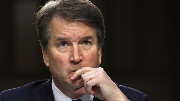 FILE - In this Sept. 5, 2018, file photo, President Donald Trump&#039;s Supreme Court nominee, Brett Kavanaugh listens to a question while testifying before the Senate Judiciary Committee on Capitol H ...