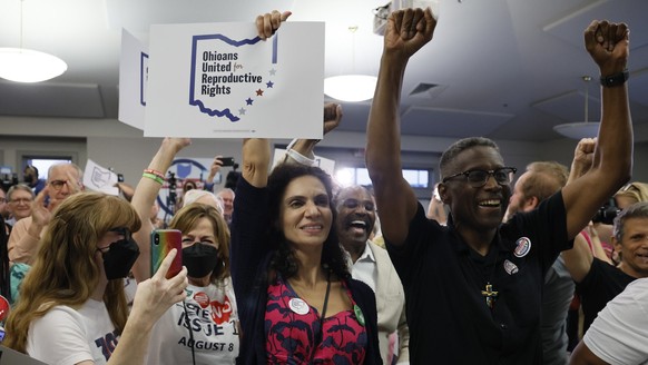 FILE - People celebrate the defeat of Issue 1 during a watch party Tuesday, Aug. 8, 2023, in Columbus, Ohio. Ohio voters have resoundingly rejected a Republican-backed measure that would have made it  ...