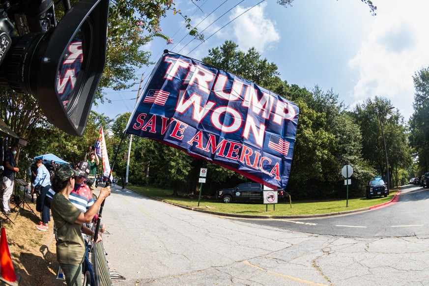 Atlanta, GA / USA - August 24, 2023: A flag that says Trump