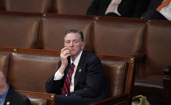 Rep. Paul Gosar, R-Ariz., listens during the tenth vote in the House chamber as the House meets for the third day to elect a speaker and convene the 118th Congress in Washington, Thursday, Jan. 5, 202 ...