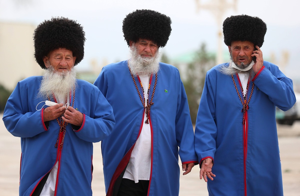 GOKDEPE, TURKMENISTAN MARCH 12, 2022: Men are seen before voting in the 2022 Turkmenistan snap presidential election at a polling station. On February 11, 2022, Turkmenistan s President Gurbanguly Ber ...