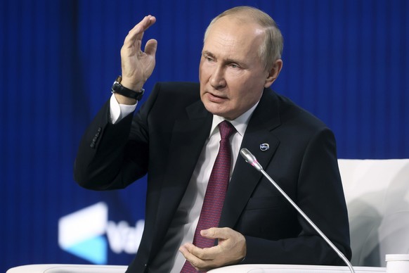 Russian President Vladimir Putin gestures while speaking at the plenary session of the 19th annual meeting of the Valdai International Discussion Club outside Moscow, Russia, Thursday, Oct. 27, 2022. ...