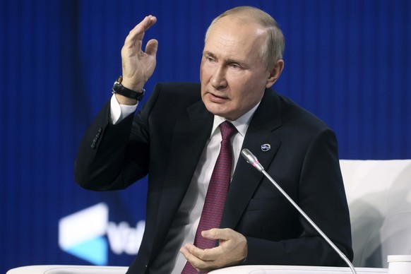 Russian President Vladimir Putin gestures while speaking at the plenary session of the 19th annual meeting of the Valdai International Discussion Club outside Moscow, Russia, Thursday, Oct. 27, 2022.  ...