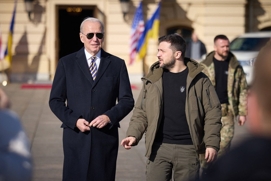 Biden Makes Surprise Visit To Ukraine Handout photo shows US President Joe Biden and Ukrainian President Volodymyr Zelensky meet at Mariinsky Palace in Kyiv on February 20, 2023. US President Joe Bide ...