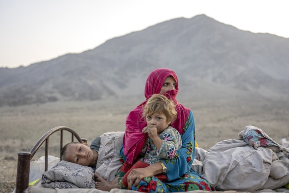 Afghan refugees settle in a camp near the Torkham Pakistan-Afghanistan border in Torkham, Afghanistan, Saturday, Nov. 4, 2023. A huge number of Afghans refugees entered the Torkham border to return ho ...