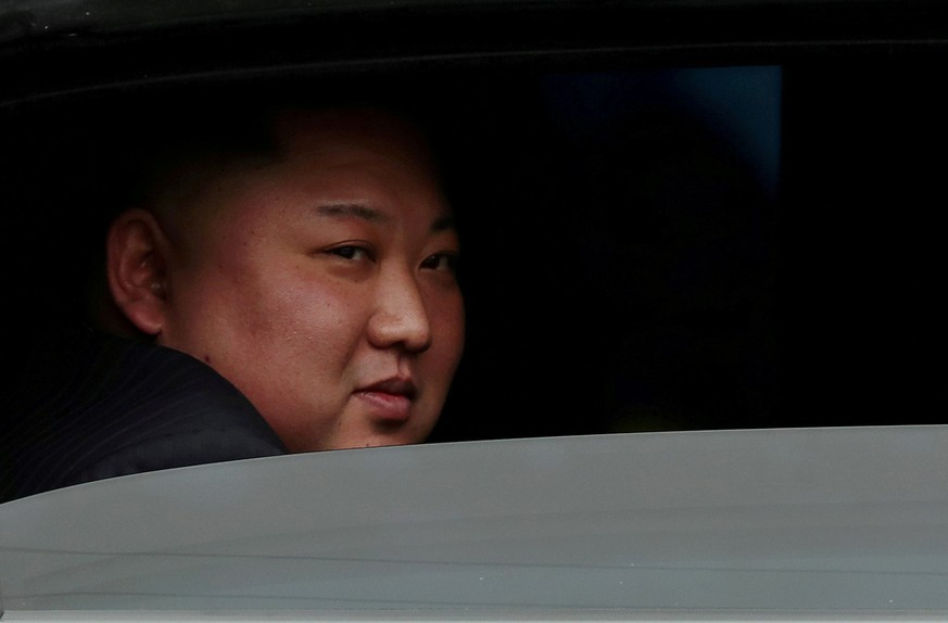 FILE PHOTO: North Korea&#039;s leader Kim Jong Un sits in his vehicle after arriving at a railway station in Dong Dang, Vietnam, at the border with China, February 26, 2019. REUTERS/Athit Perawongmeth ...