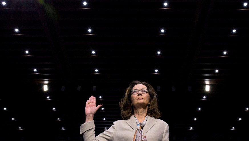 FILE PHOTO: CIA director nominee and acting CIA Director Gina Haspel is sworn in to testify at her Senate Intelligence Committee confirmation hearing on Capitol Hill in Washington, U.S., May 9, 2018.  ...
