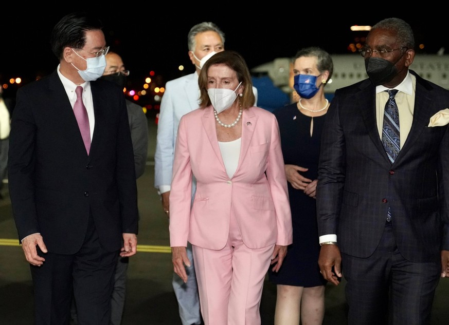August 2, 2022, Taipei, Taipei, Taiwan: US House Speak Nancy Pelosi M with her delegation arrives in Taiwan as she is welcomed by Taiwan Foreign Minister Joseph Wu L at Taipei Songshan International A ...