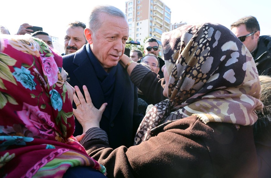 Turkish President Recep Tayyip Erdogan and his wife Emine Erdogan meet with earthquake victims and pay condolences at the tent city after 7.7 and 7.6 magnitude earthquakes hit multiple provinces of Tu ...