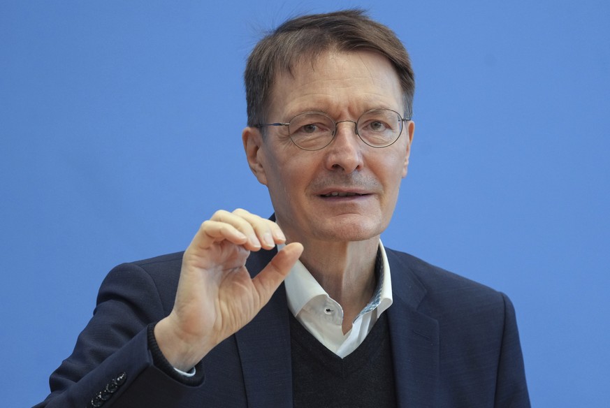 German Health Minister Karl Lauterbach addresses the media during a press conference in Berlin, Germany, Friday, Feb. 25, 2022 on the current coronavirus pandemic in Germany. (AP Photo/Michael Sohn)