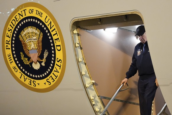 President Joe Biden walks down the steps of Air Force One at Dover Air Force Base in Delaware, Wednesday, July 17, 2024. Biden is returning to his home in Rehoboth Beach, Del., to self-isolate after t ...