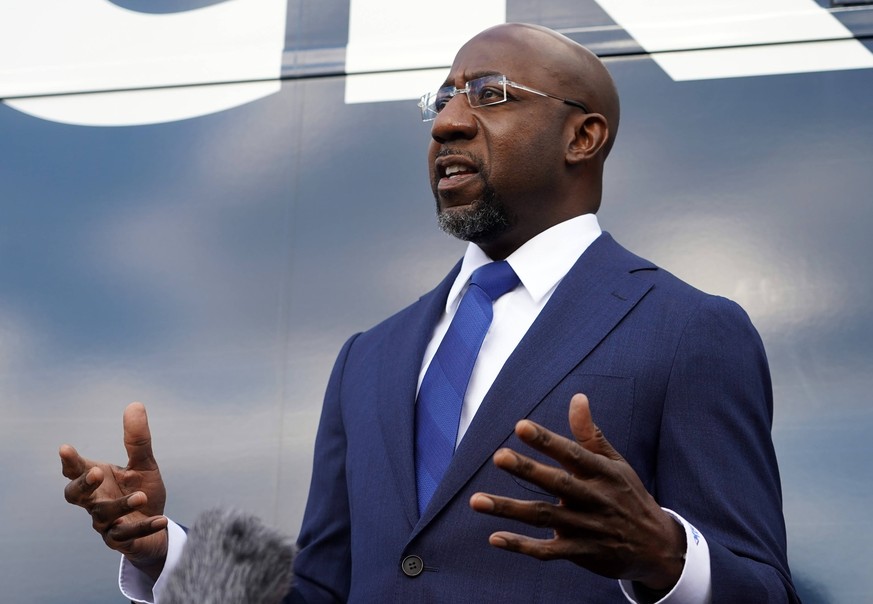 Democrat Raphael Warnock who is running for the Georgia U.S. Senate speaks to the media at IBEW Local 613 in Atlanta, Georgia on Tuesday, January 5, 2021. . PUBLICATIONxINxGERxSUIxAUTxHUNxONLY ATL2021 ...