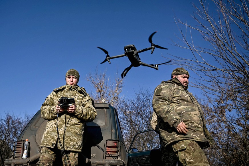 Ukrainian military hones skills UKRAINE - DECEMBER 28, 2023 - Servicemen of an artillery unit of the 128th Mountain Assault Brigade of the Ukrainian Ground Forces train to use a drone during a trainin ...