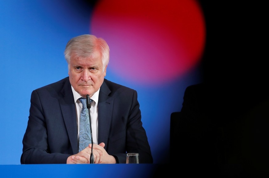 German Interior Minister Horst Seehofer attends a news conference a day after a man killed an 8-year-old boy by pushing him on to train tracks at Frankfurt&#039;s main train station, in Berlin, German ...