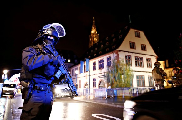 Security forces secure area where a suspect is sought after a shooting in Strasbourg, France, December 11, 2018. REUTERS/Christian Hartmann TPX IMAGES OF THE DAY