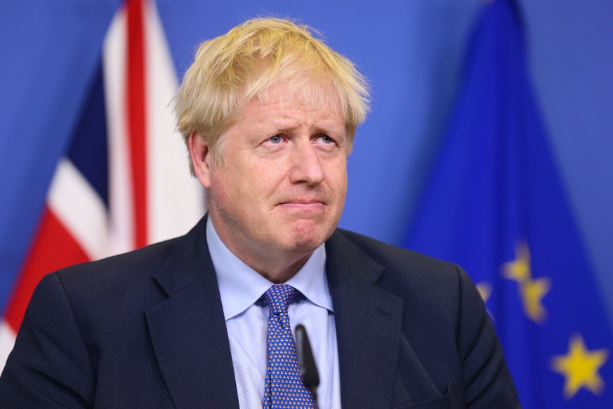 191017 -- BRUSSELS, Oct. 17, 2019 -- British Prime Minister Boris Johnson attends a press conference at the European Commission headquarters in Brussels, Belgium, Oct. 17, 2019. The European Union and ...